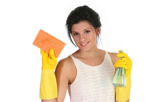 Local cleaner working in a TW8 flat with bathrooms and floors needing attention